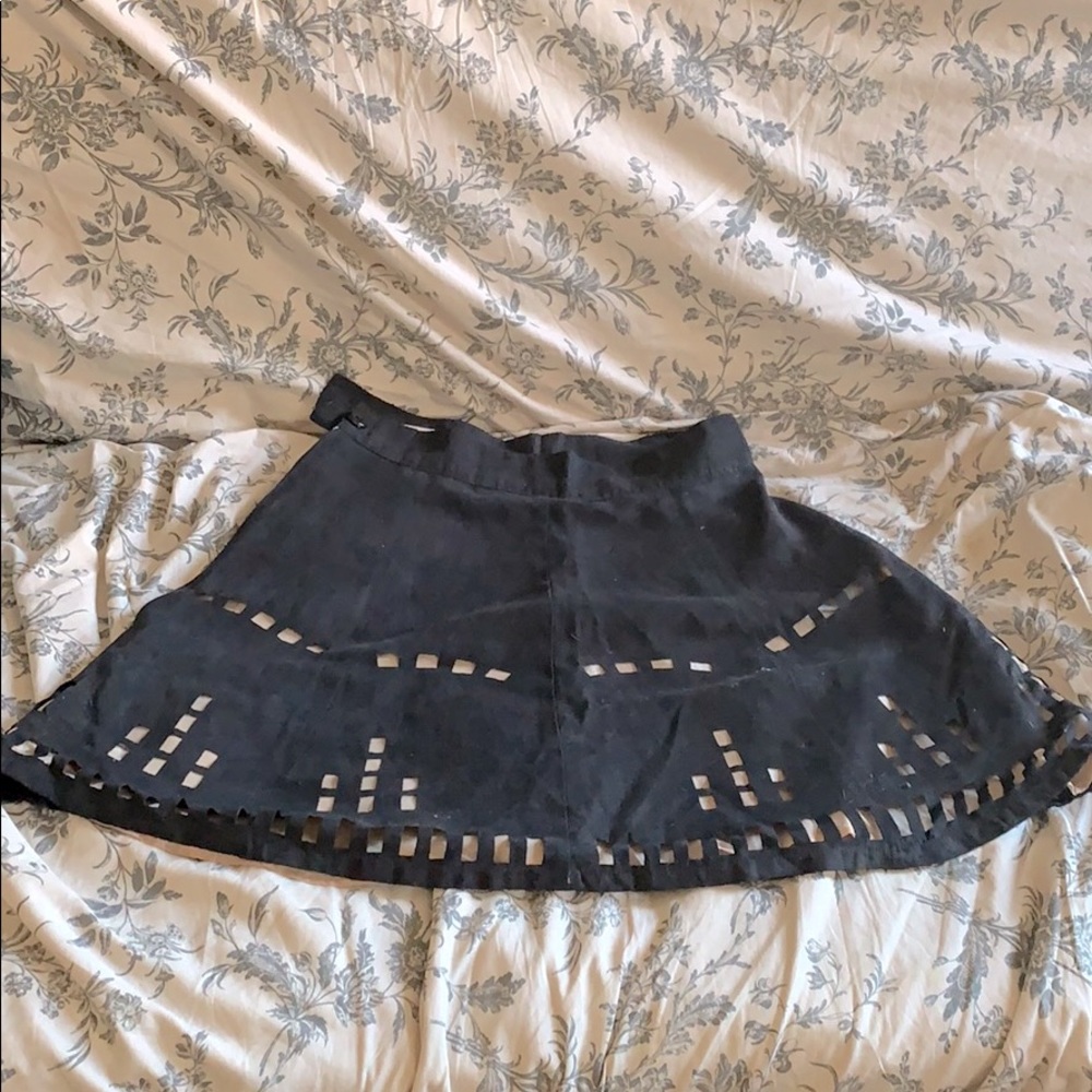A line skirt with geometric cutouts